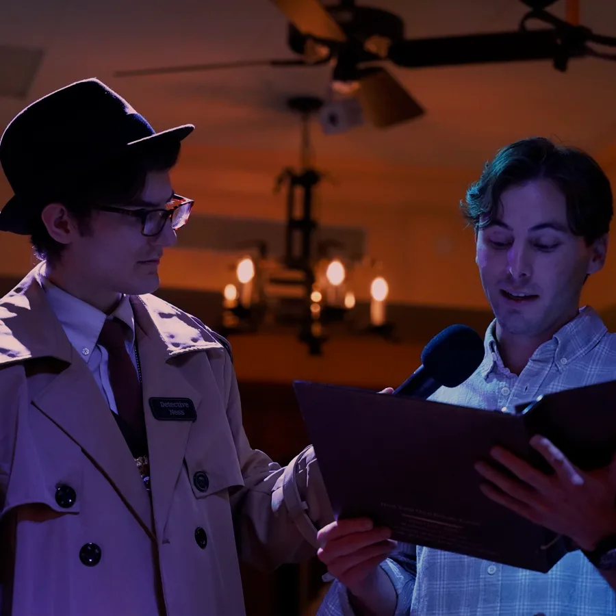 Professional actors performing at a Toledo murder mystery