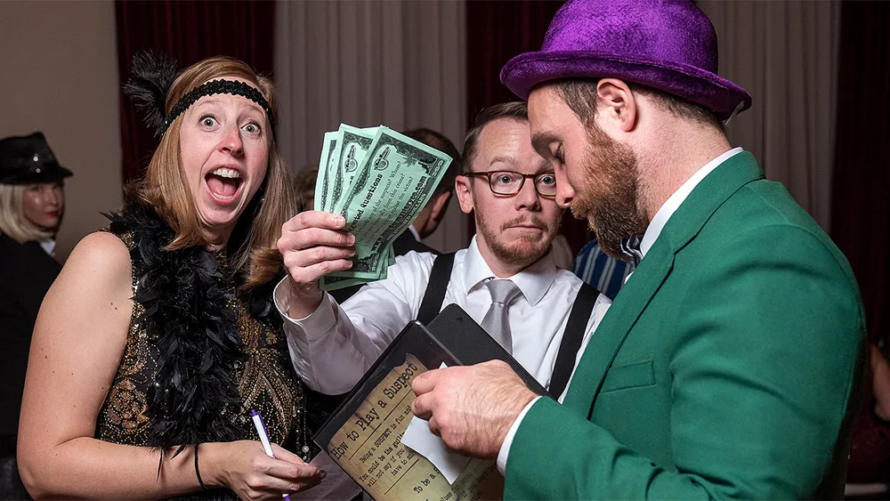 Guests enjoying a Toledo murder mystery party